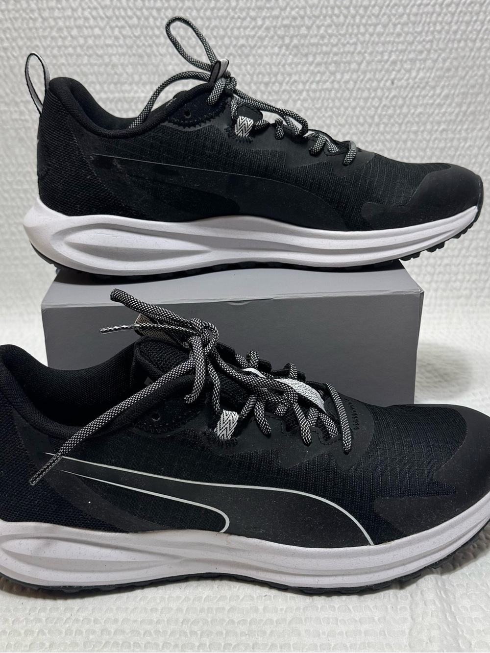 Puma Twitch Runner Trail running shoes in a black and white colorway 10
